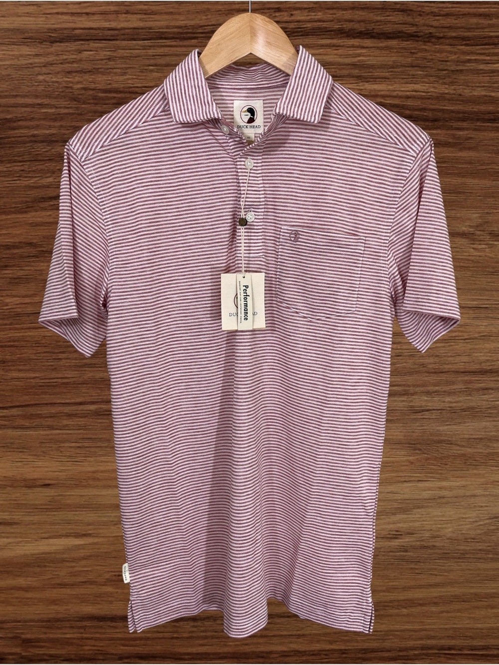 Duck Head Men’s Striped Performance Polo. Baked Red Heather. Size XS